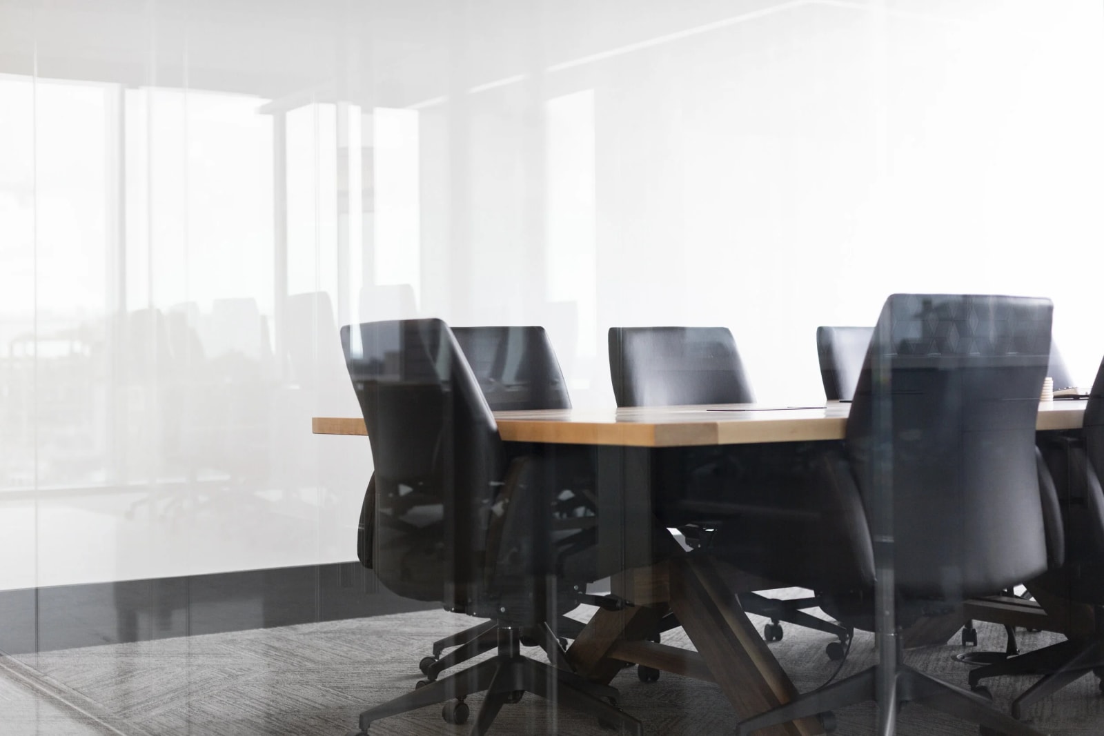 A team meeting around a conference table.