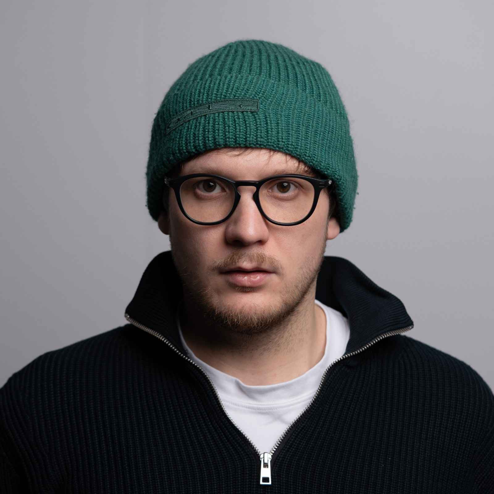 Konrad Kalinowski holding a camera