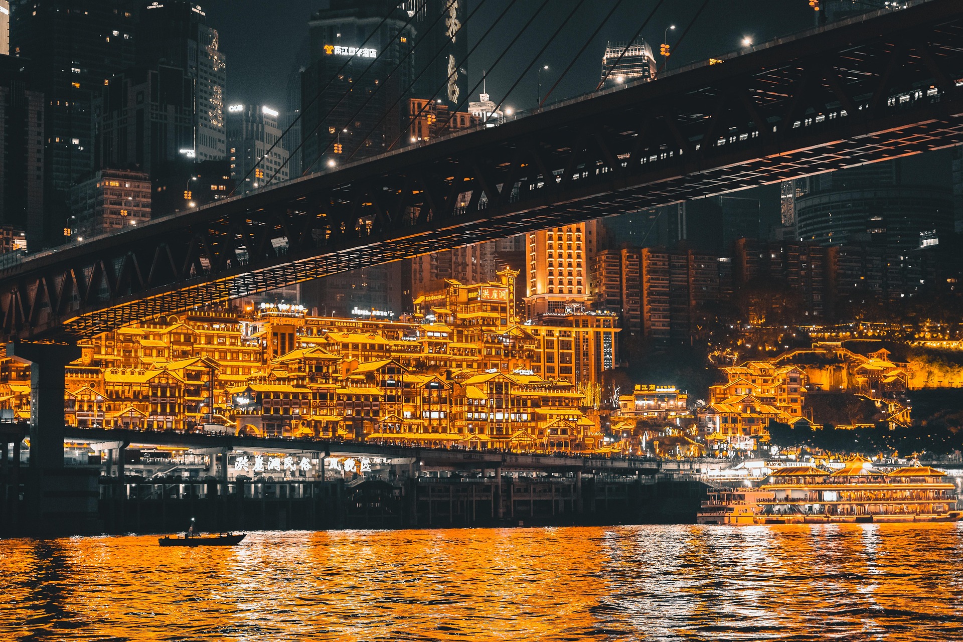 Hongya Cave stacked buildings lit at night