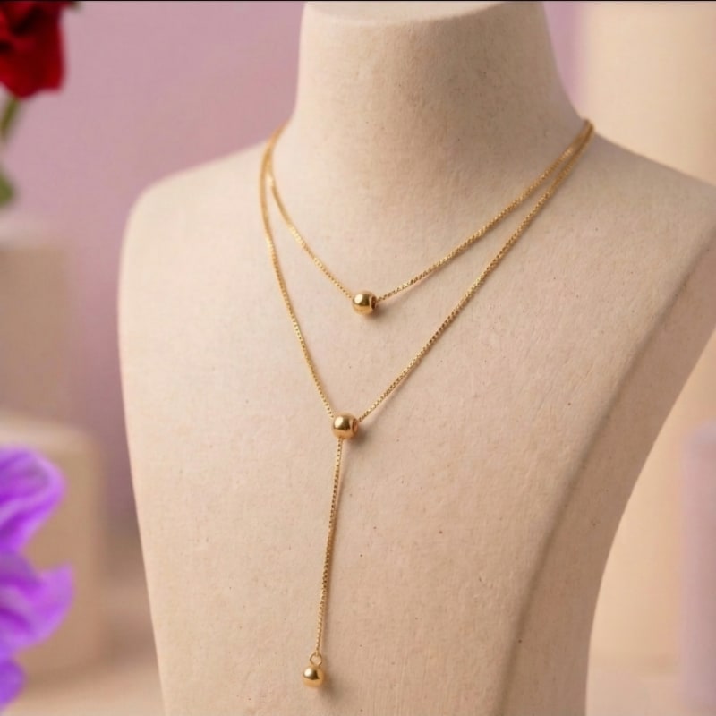 COLLAR DOBLE CON ESFERAS