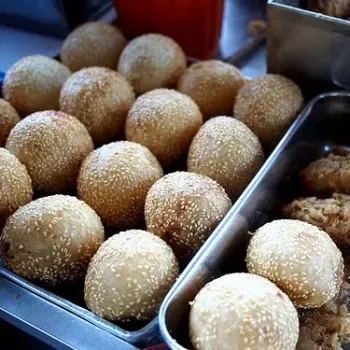 Glutinous Rice Balls With A Sesame Seed Coating, And A Sweet Peanutty Center
