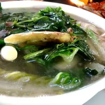 Greens In Powerful Seafood Stock