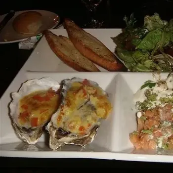 Avocado Salmon and Cheese Baked Oysters
