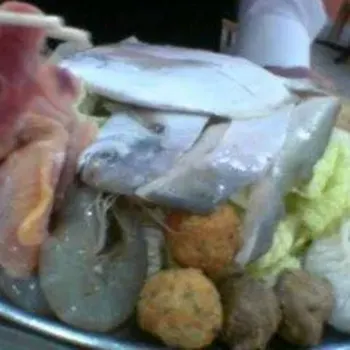 Raw Seafood on a bed of Chinese Cabbage
