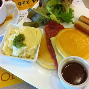 Pancakes With Mash Potato, Sausages And Bacon
