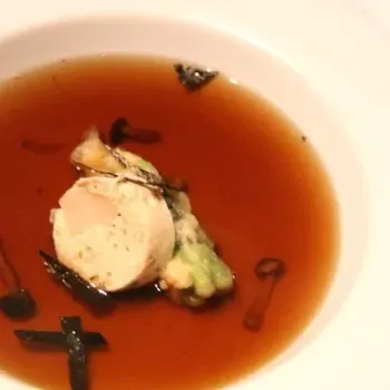 Double Boiled Free Range Chicken And Mushroom Consommé Served With Chicken And Scallop Terrine, Enoki Mushroom And Tempura Baby Asparagus