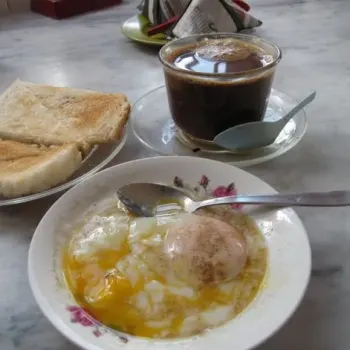 Toasted Bread, Half Boiled Egg and Coffee