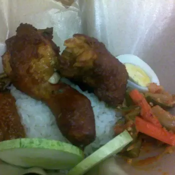 
Nasi lemak with ayam goreng and acar