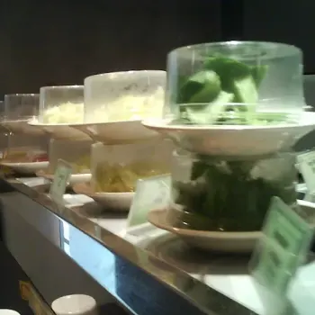 Moving food on the belt