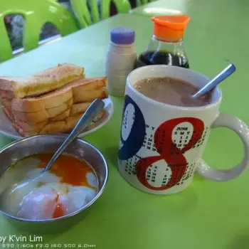 Half Boiled Egg With Kaya Butter Toast Bread and Milo