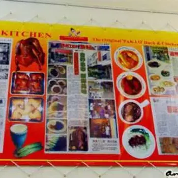 Poster Of Newspaper Clippings And Pictures Of Their Signature Dishes