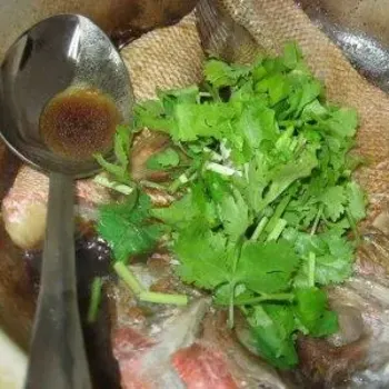 Baked Red Lion Fish in Clay Pot