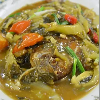 Braised Fried Black Pomfret with Preserved Mustard and Tomatoes