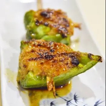 Sweet Bell Pepper Halved, Stuffed With The Minced Chicken