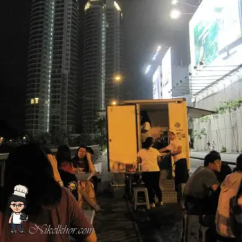  Still taking time for setting up their mobile kitchen.