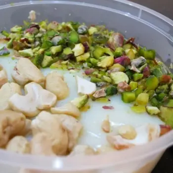 Mohalabia - creamy milk dessert topped with nuts
