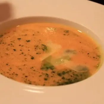 Pumpkin and Sweet Potato Soup with Sour Cream and Tapenade Toast