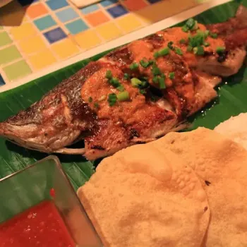  Malay Whole Sea Bass with Turmeric, Chili Paste & Lemongrass with Young Papaya Salad, Steamed Rice with Traditional Sambal