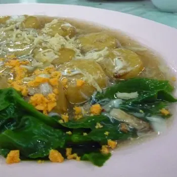 House made Tofu with How Siu Choy, assorted seafood like crab meat, dried scallop and roe