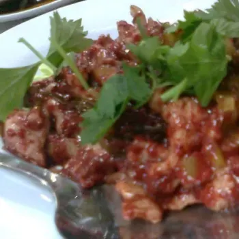 Stir fried red wine paste with pork and salted vegetable