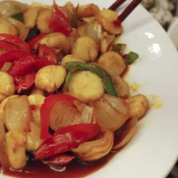 Stir fried fresh scallop with onion/red & green sliced capsicum