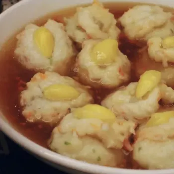 A slice of Lotus root topped with Fish paste (too much flour)/shrimp/gingko and bathed with a smooth tasty gravy