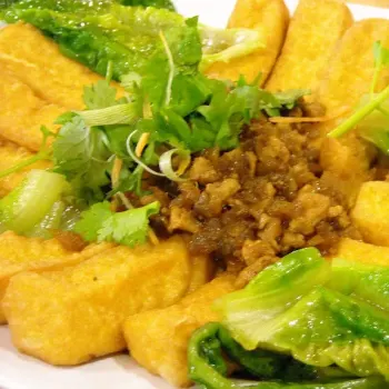 Bean Curd-Deep Fried Until Golden Brown-Topped With Minced Meat And Dry Prawns-Served With Some Blanched Romaine Lettuce