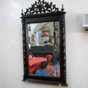 The antique ornate mirror
