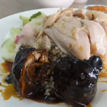 Hainanese Chicken Rice With Poached Chicken Drum Stick And A Roasted "Spare Part Special"