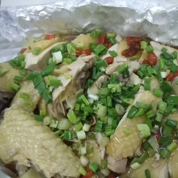 Steamed Herbal Village Chicken In Aluminum Foil 