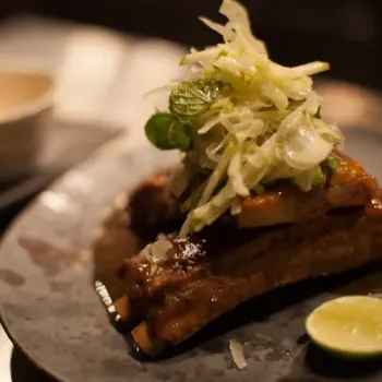 Slow Braised Baby Pork Ribs in Yakaniku Sauce, served with Red Radish, Apple