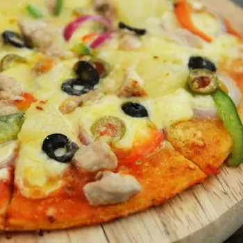 Hawaiian Pizza – Chicken, Pineapples, Capsicum, Onions and Olives.