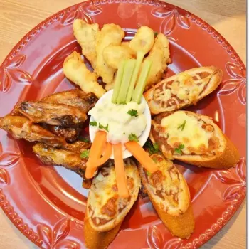 Triple Play Platter  – Grilled BBQ Chicken Wings, Fish Fritters and 