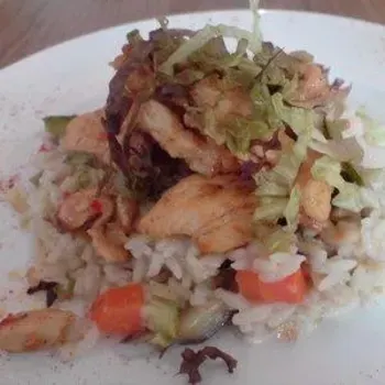 Thai Style Chicken on bed of Melt Vegetable Rice