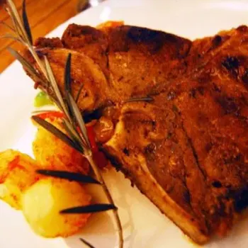 Grilled T-Bone Steak Served With Roasted Potatoes