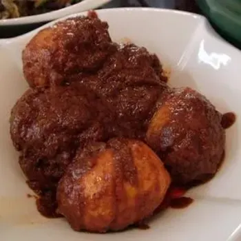Deep-fried hard-boiled egg in sambal