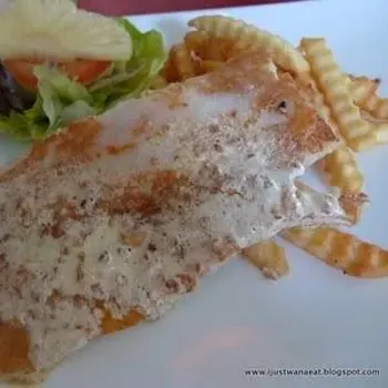 Grilled Fish with butter and garlic sauce