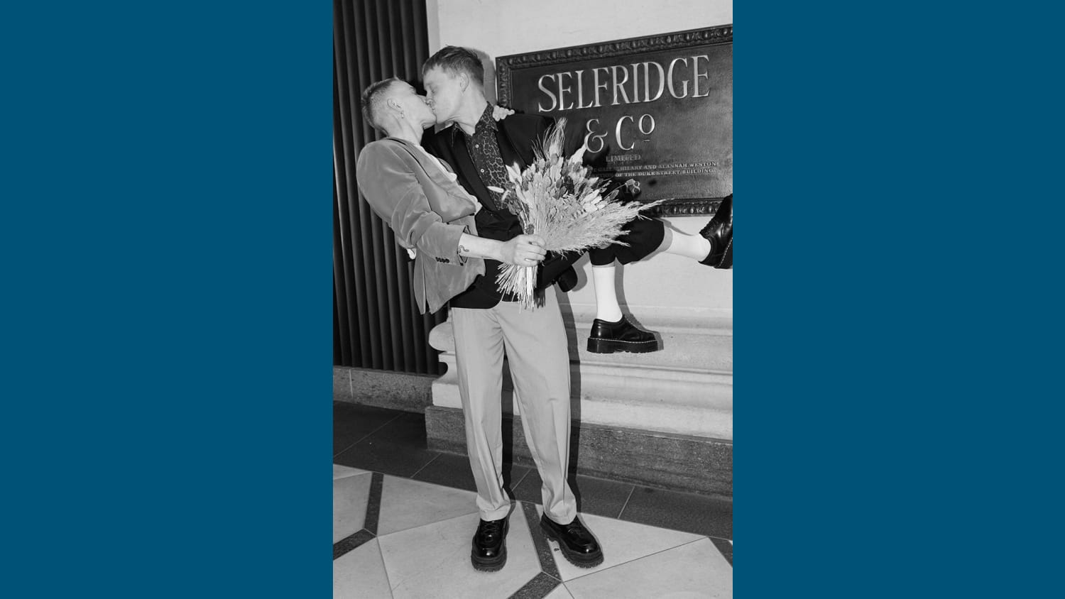 WEB WEDDINGS AT SELFRIDGES featuring Kampus Toborg and Marc Gee Finch kissing outside the London Store free to use editorially from Tuesday 11 May courtesy of Selfridges