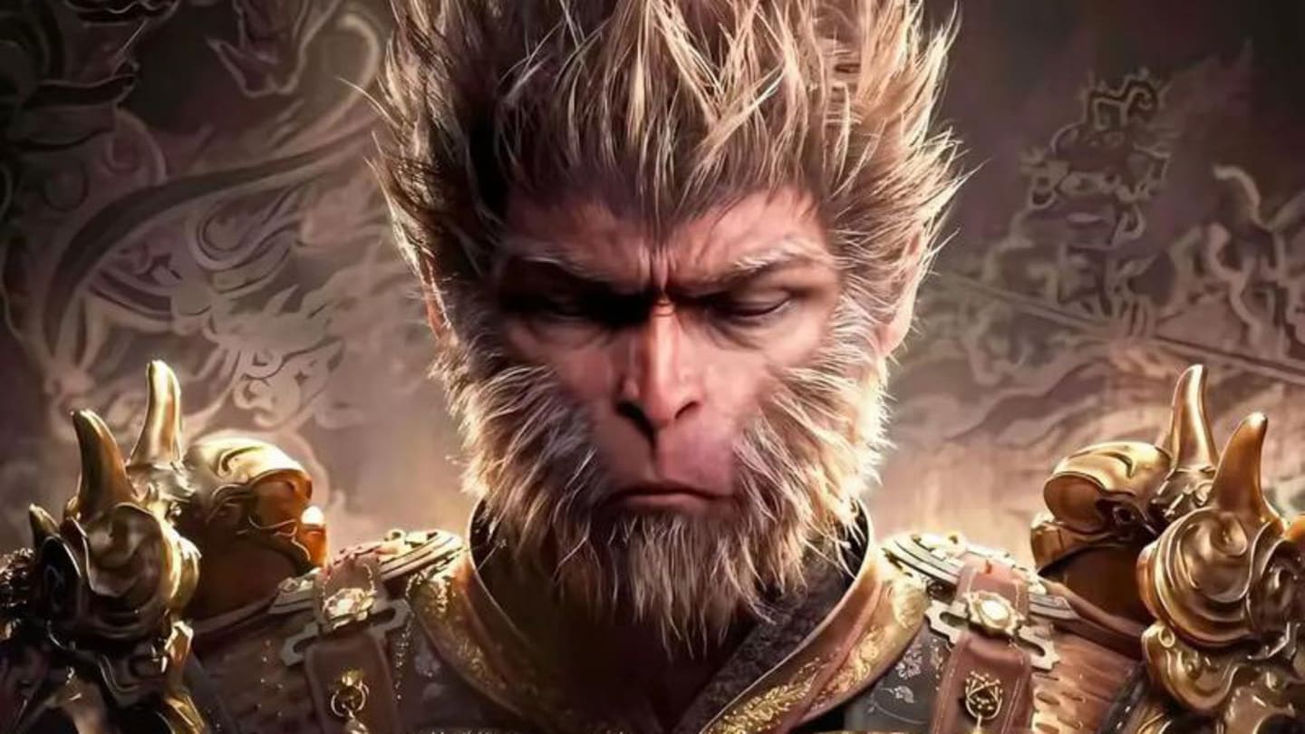 Close-up of an armored fantasy warrior with ornate gold shoulder plates; the face is blurred.
