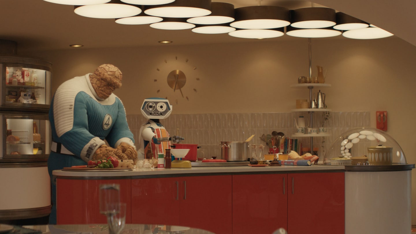 Scene from Marvel's Fantastic Four, 2025. The Thing and H.E.R.B.I.E the robot are cooking diner in a retro style kitchen.
