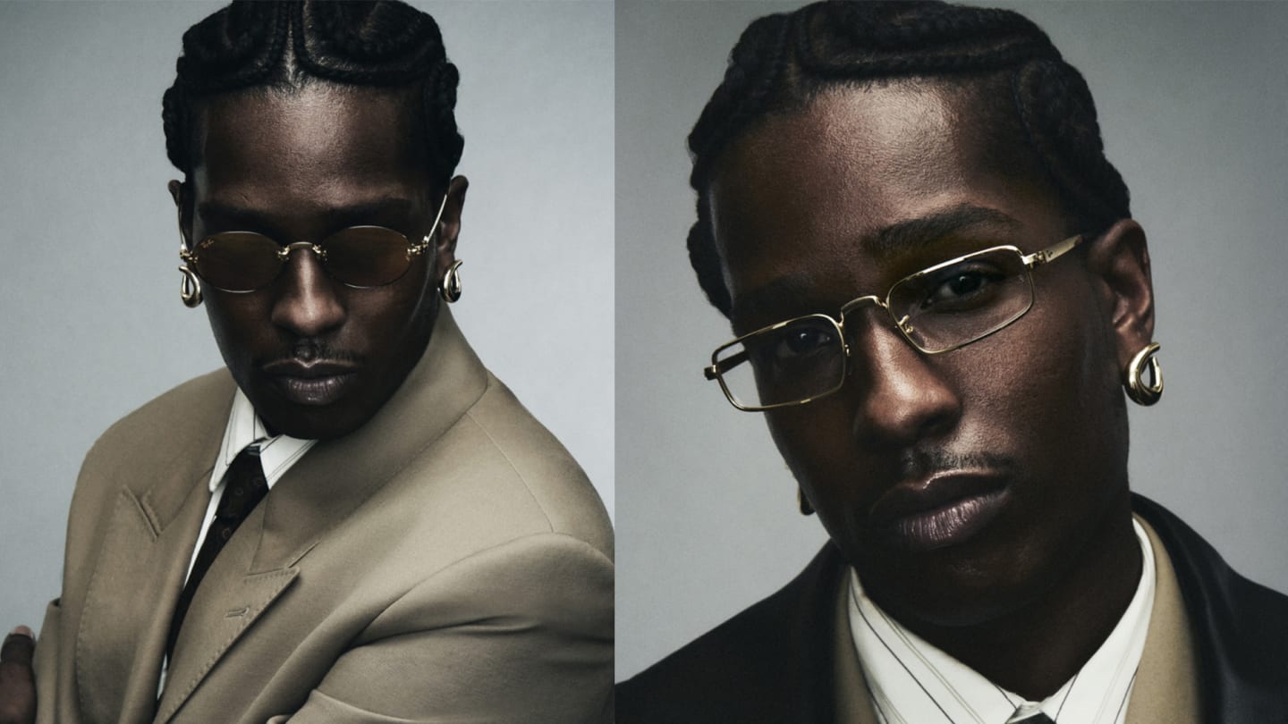 A$AP Rocky models his own retrofuturist eyewear designs for Ray Ban. He wears a light fawn suit and and collar and tie. The glasses are metal-framed and allude to vintage designs.