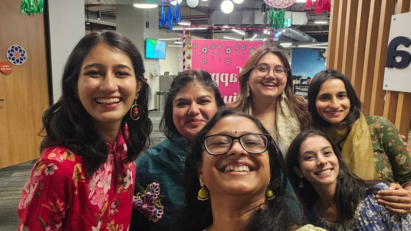 VML India Gurugram women employees posing together during the Diwali 2025 office celebration in festive traditional attire.