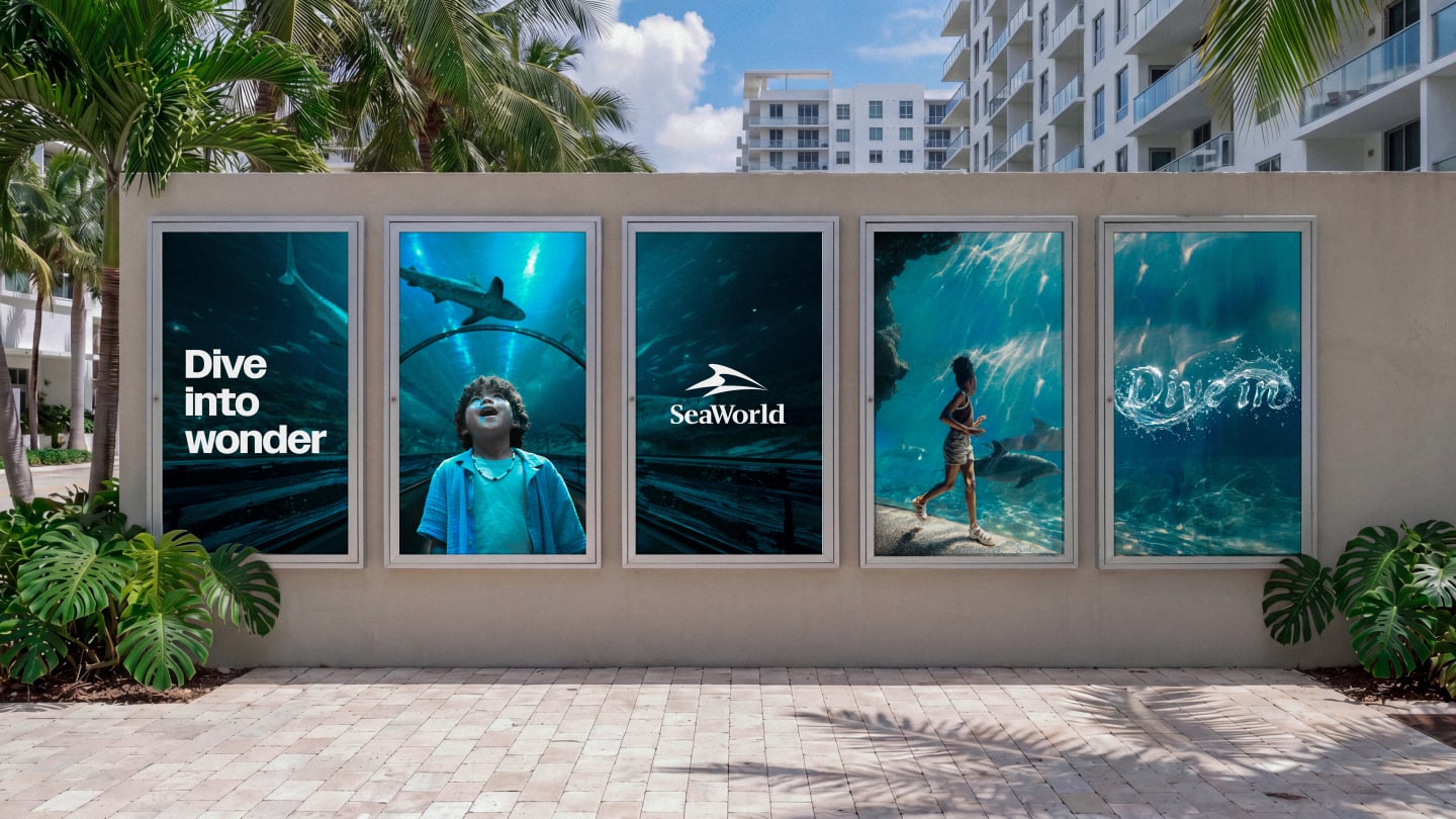 Image of SeaWorld out of home ads on the side of a building.