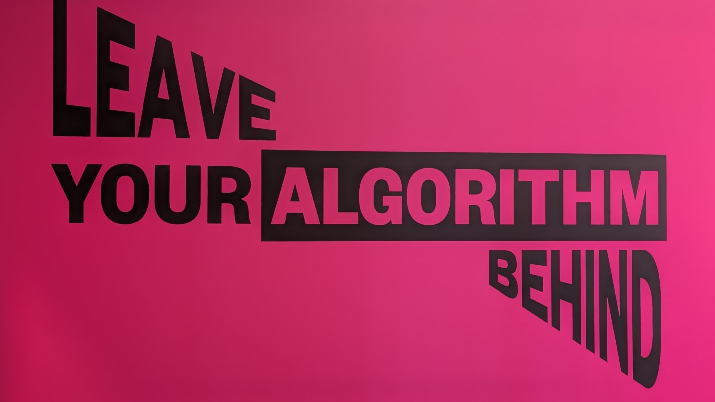Graphic text on a pink background that reads, "LEAVE YOUR ALGORITHM BEHIND."