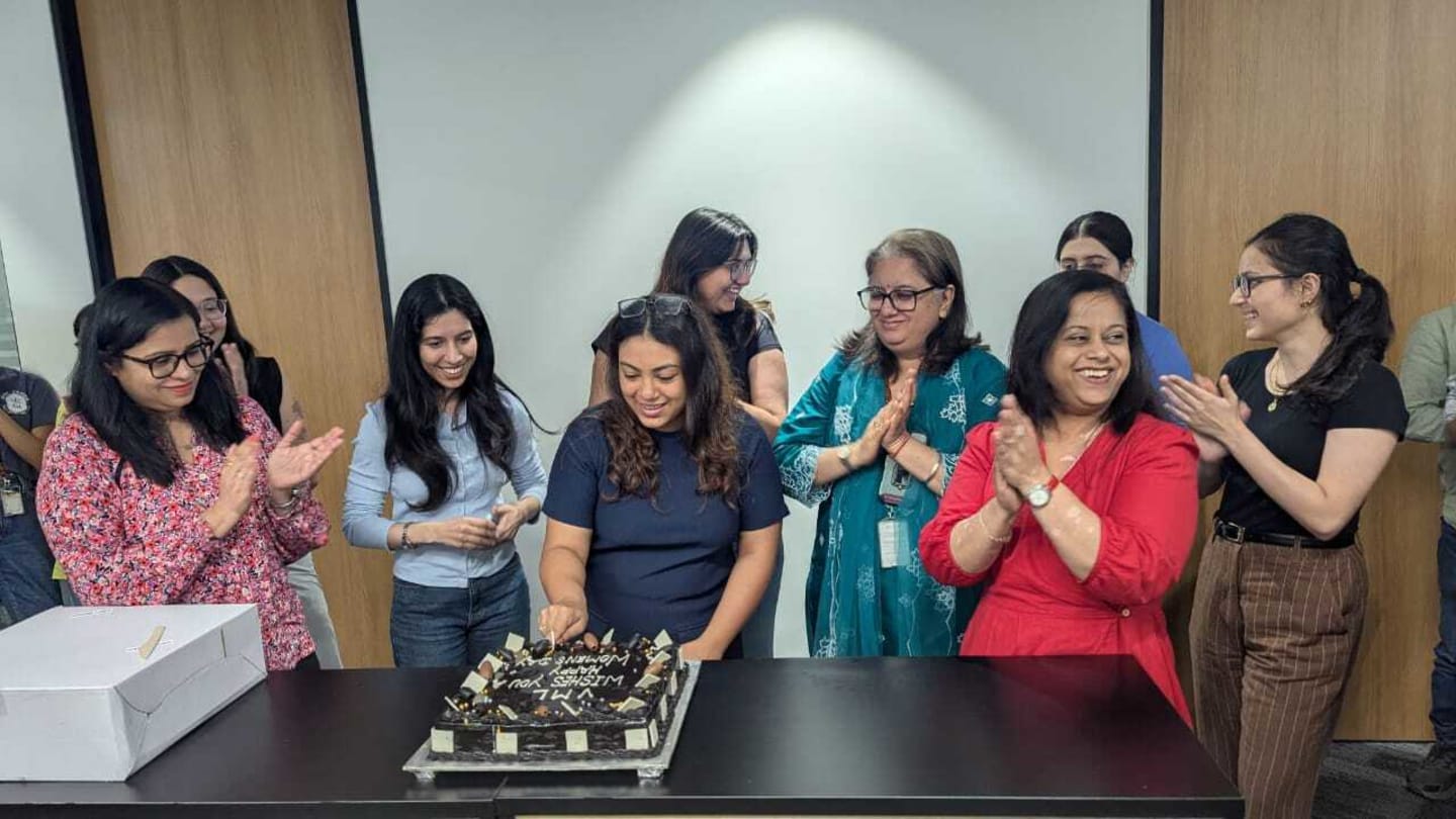 Women of VML India celebrating International Women’s Day 2026 by cutting cake at the Gurgaon office.