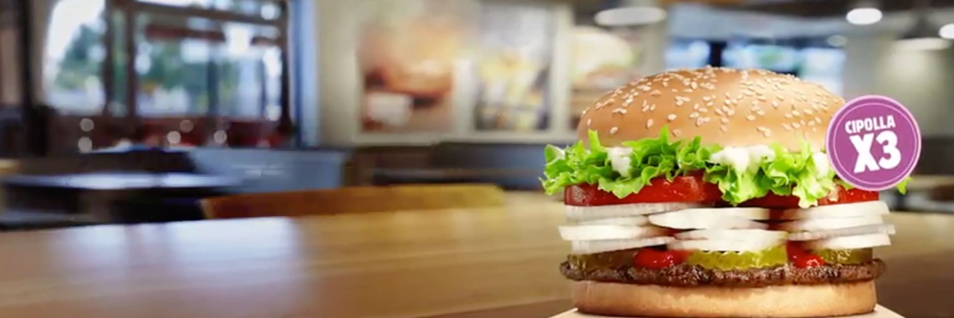 Burger King Whopper on wooden table