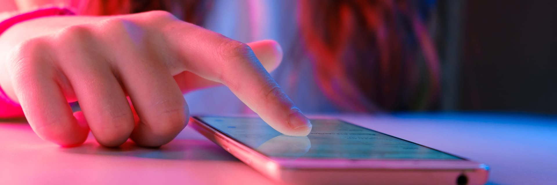 Girl scrolling through phone