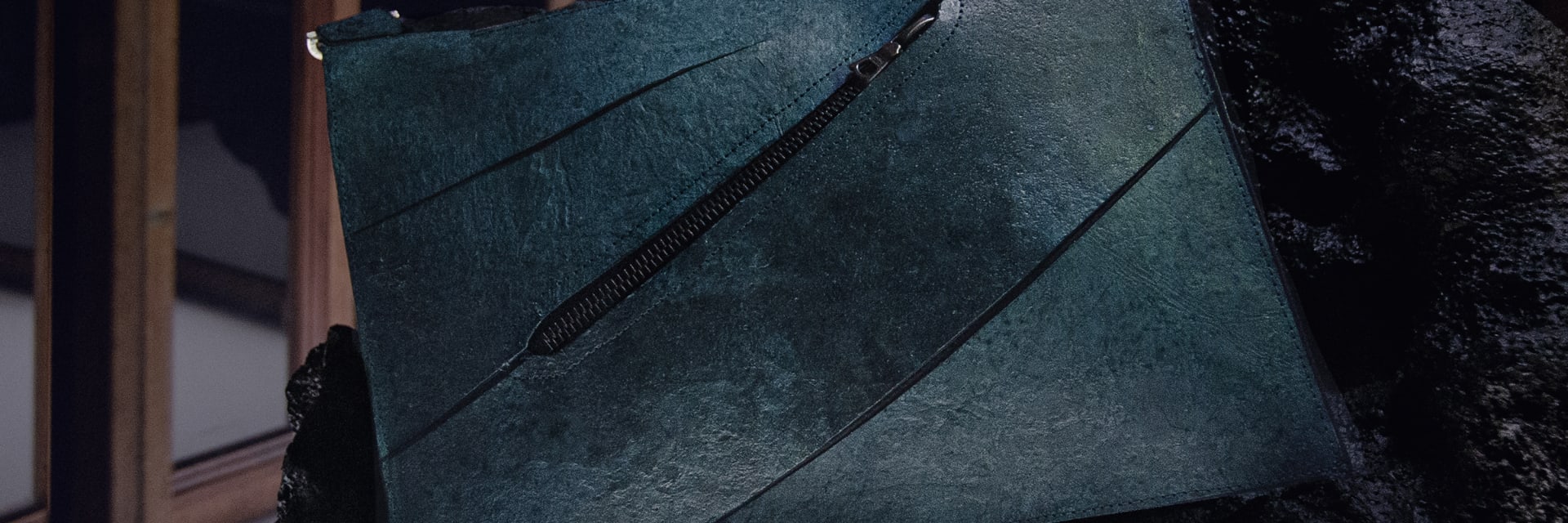 Close up of a handbag made out of T-Rex leather