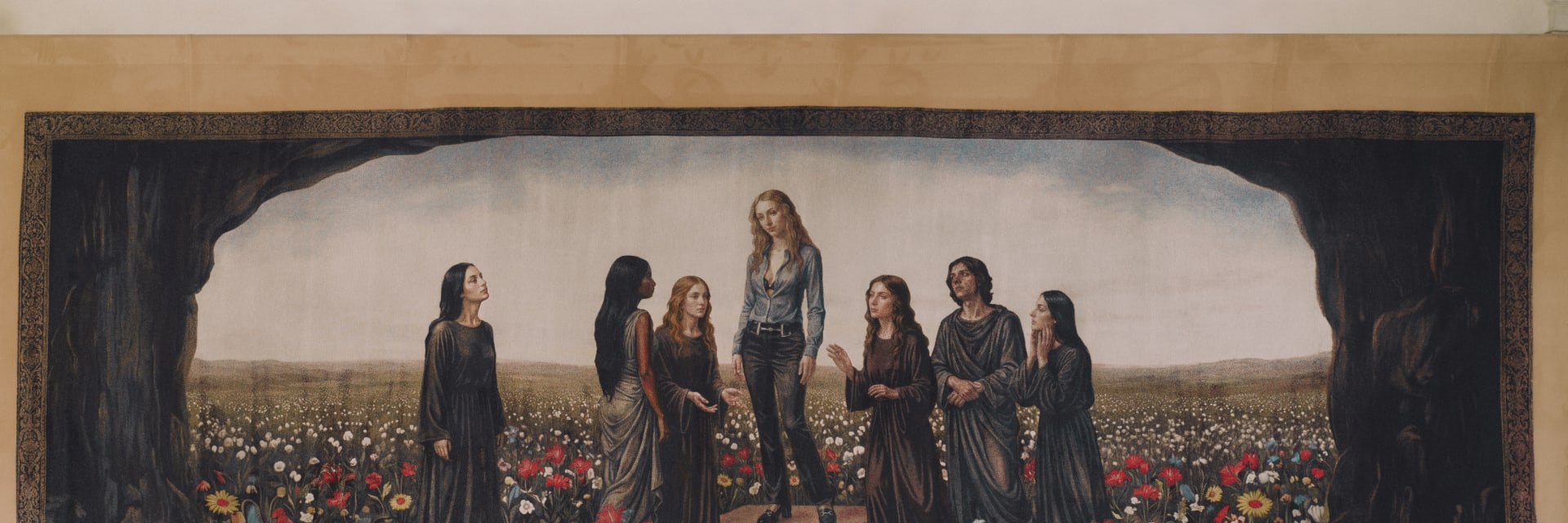 What appears to be a classical tapestry on closer inspection depicts a crowd of adoring women around another in the centre wearing jeans and a denim shirt.