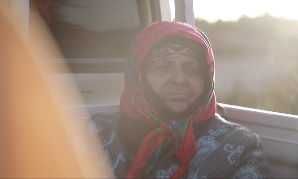 old woman with headscarf